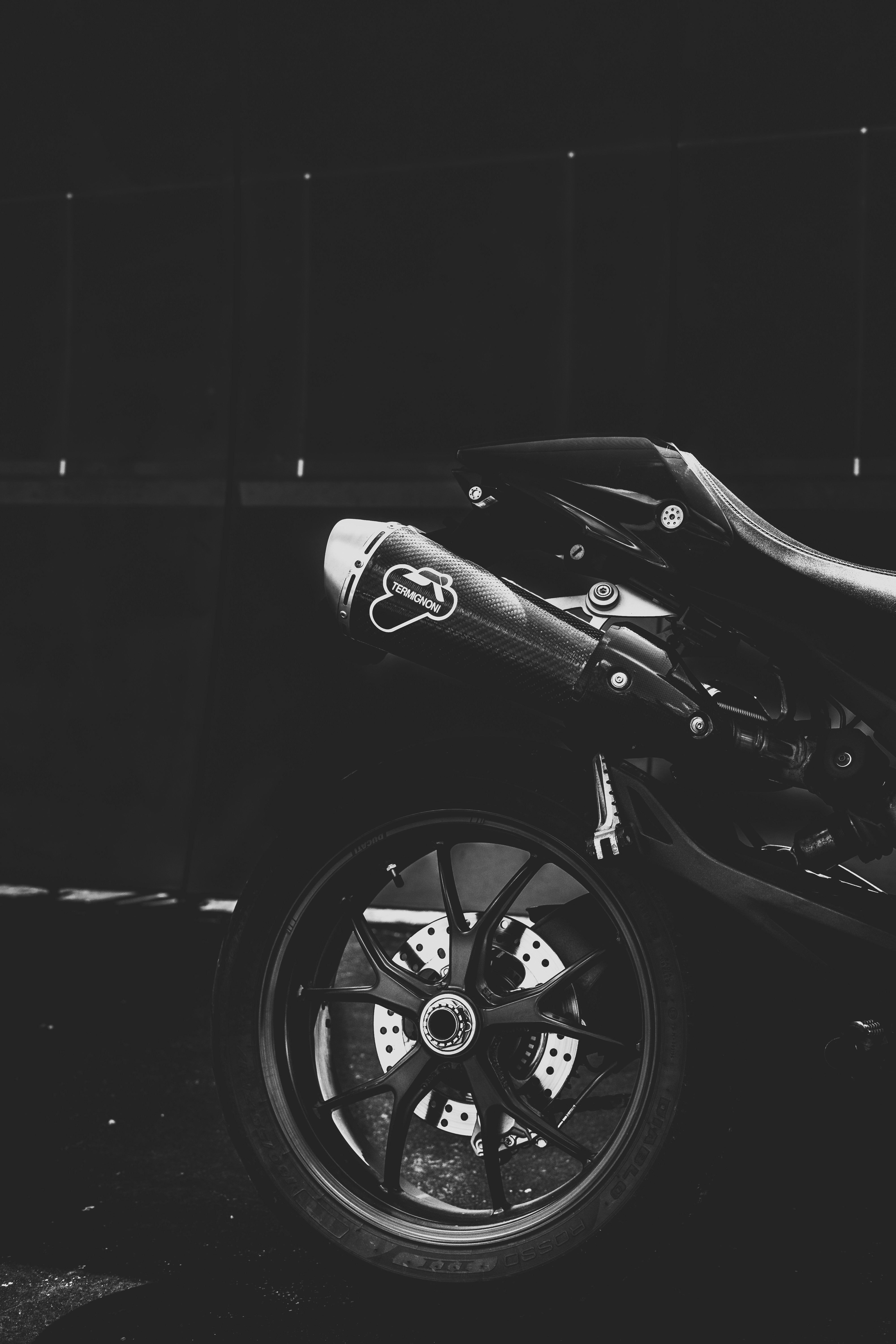 grayscale photo of black motorcycle